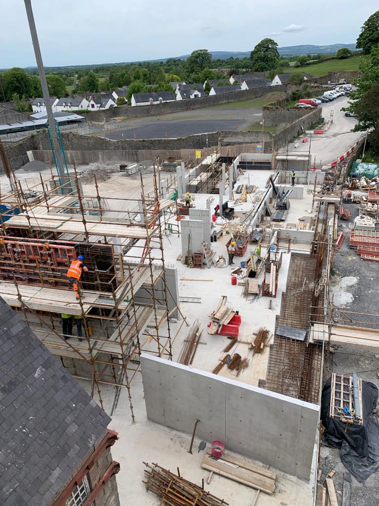 workers on scaffolding in the Cashel Palace Hotel while under construction