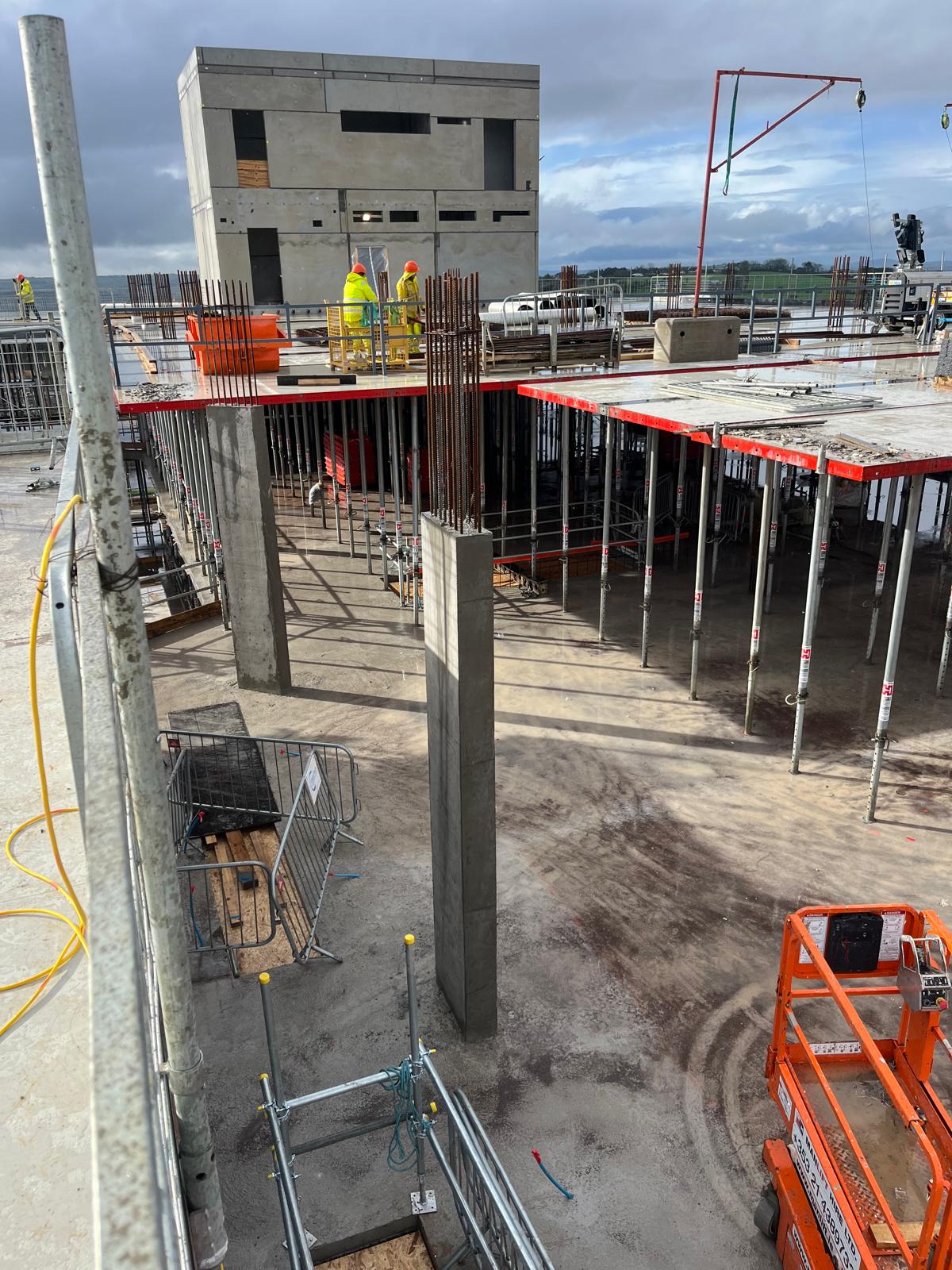 concrete form pillars that have been freshly poured